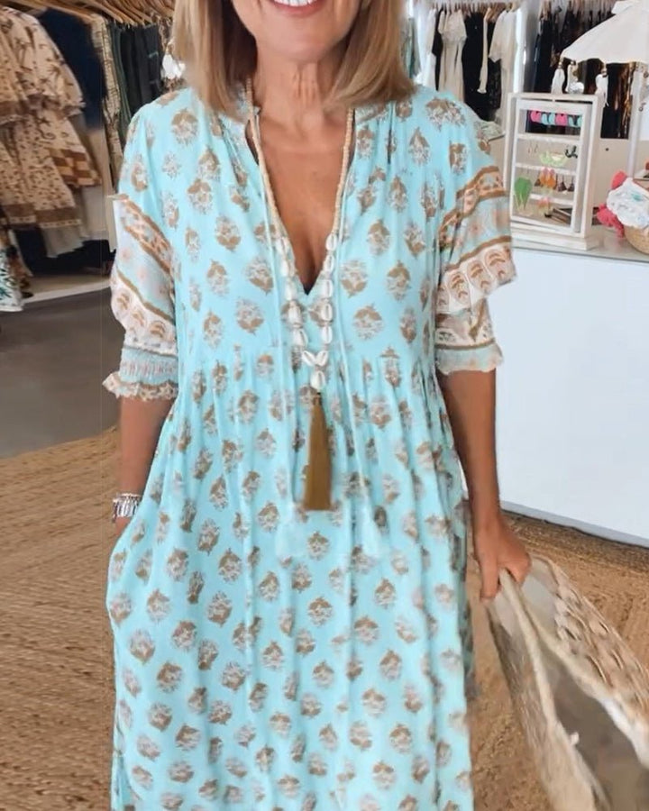 Signe™ - Chic blomstret kjole med V-hals